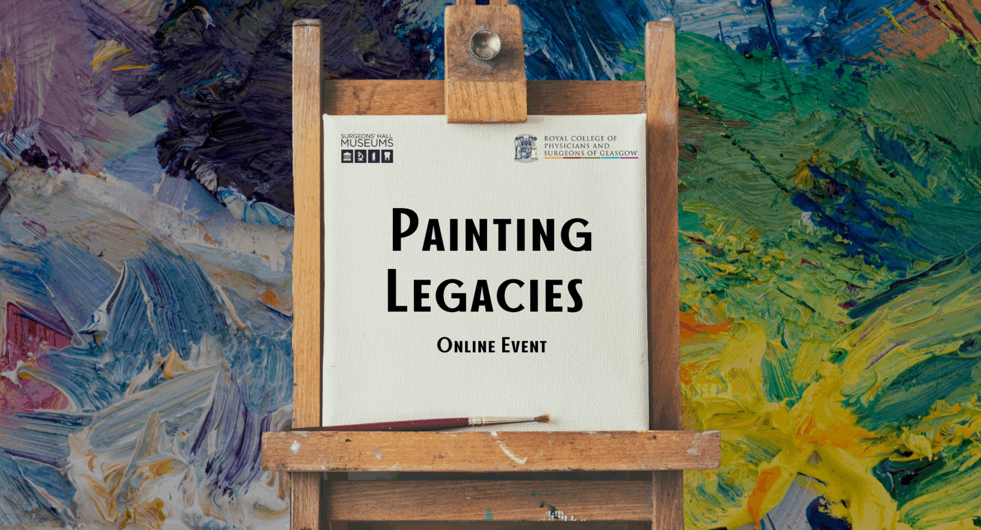An easel in front of a colourful painted background